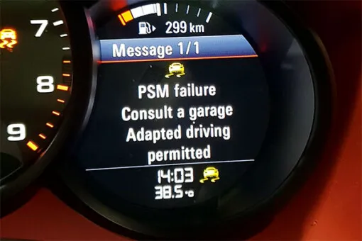 Porsche PSM warning light on dashboard